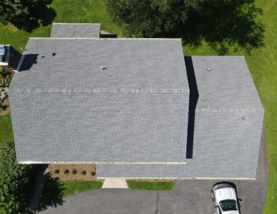 After asphalt roof replacement in Asbury